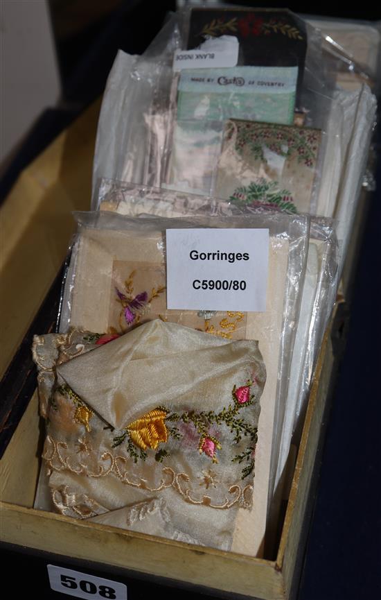 A collection of WWI embroidered silk postcards and Stevengraph bookmarks